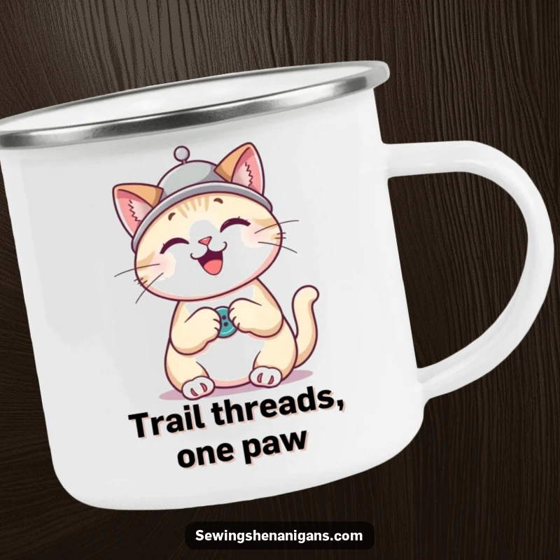 Funny cat wearing a thimble hat sewing a button, a durable and humorous camping mug for outdoor enthusiasts.