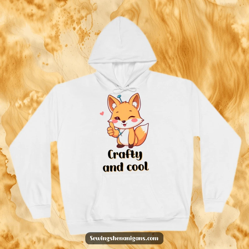 Funny happy fox with a sewing pin in fur, giving a thumbs up, on a cozy hoodie, a warm and funny gift.
