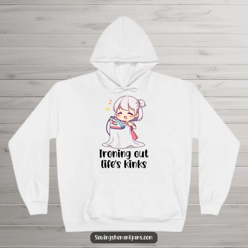 Funny hoodie showing a character happily ironing a rumpled fabric piece, exuding supreme ironing enthusiasm, ideal for cold days.