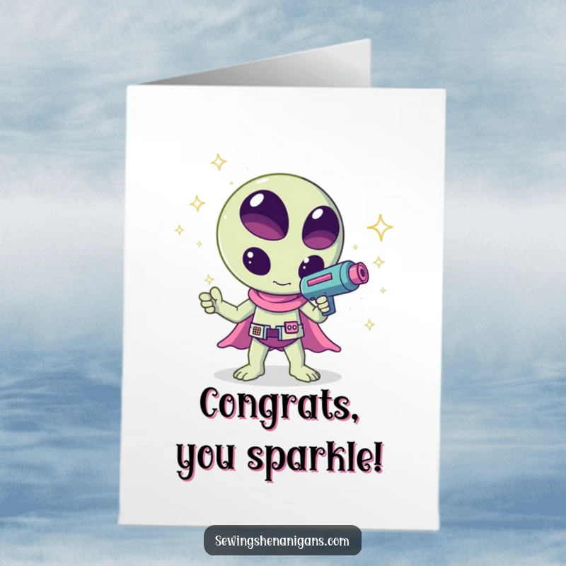Funny Free Printable Congratulations Card: A happy kawaii alien fires a ray gun that shoots dazzling sparkles to celebrate success.