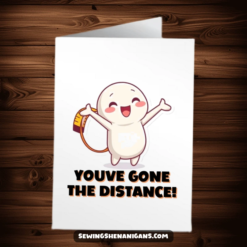 Funny Free Printable Congratulations Card with a happy measuring tape character extending its length to signify a huge accomplishment.