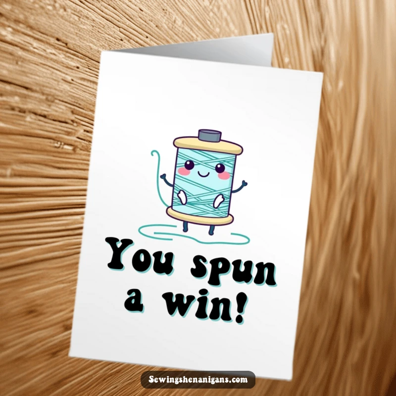 Funny Free Printable Congrats Card shows a happy spool of thread unrolling into a long chain, symbolizing growth and connection.