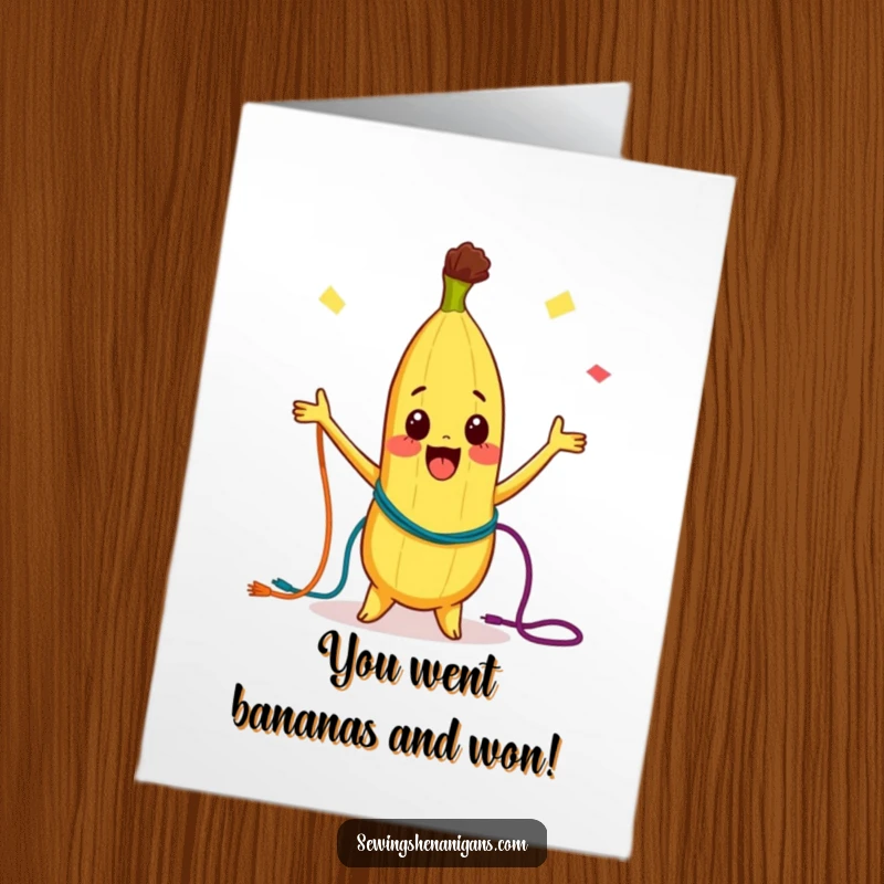 Funny Free Printable Congrats Card: A curious Banana character joyfully juggling colorful threads, celebrating success with flair.