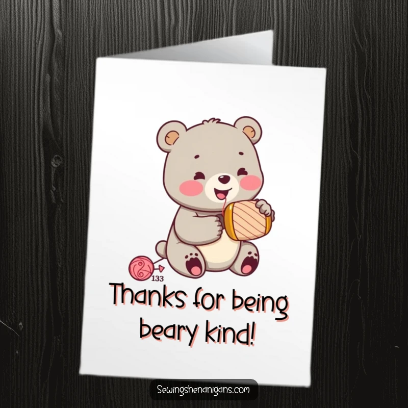Funny Free Printable Thank You Card: A happy bear cub wearing a thimble hammers a spool, showing energetic thanks.