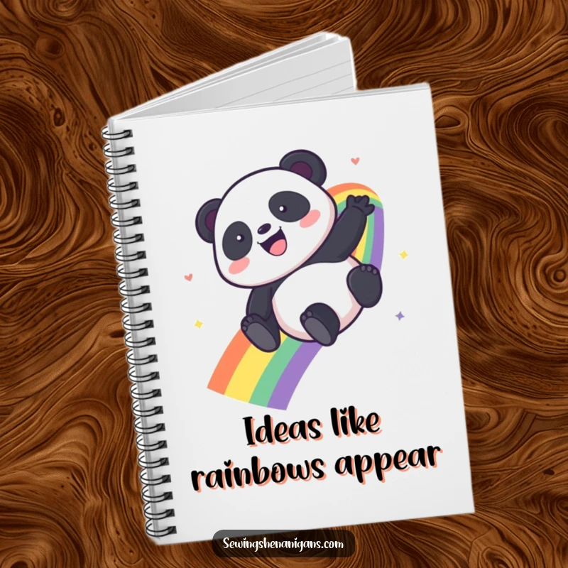 Funny Kawaii Panda notebook with a panda sliding down a rainbow, perfect for creative thoughts and notes.