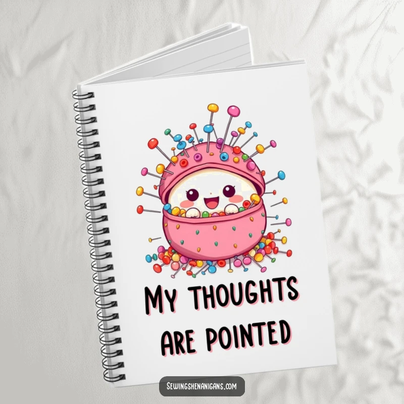 Funny Pincushion Notebook cover art of a cute character brimming with brightly colored sewing pins, perfect for note-taking and planning.