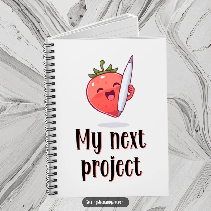 Funny Strawberry Needle Notebook: A cheerful strawberry character holding a giant needle, ideal for a funny and practical gift.