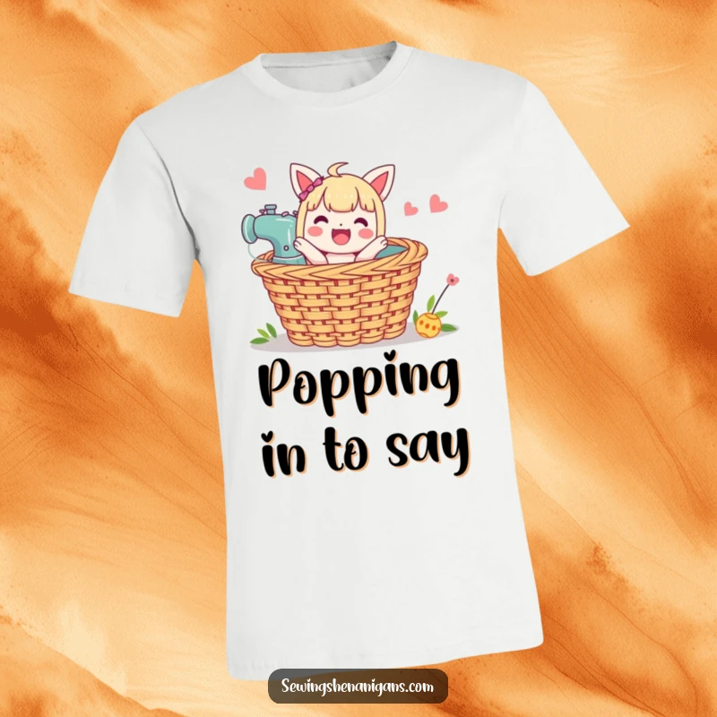 Funny Sewing Basket T-Shirt: A character pops joyfully out of a sewing basket, showcasing a love for crafts.