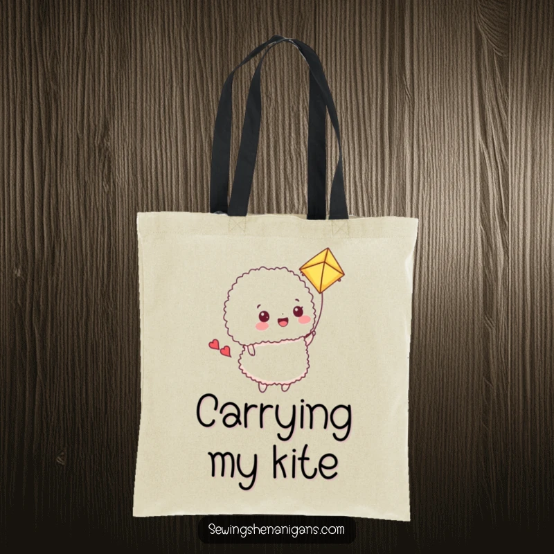 Funny Tote Bag: A happy pincushion flies a fabric scrap kite, a humorous and practical sewing accessory.