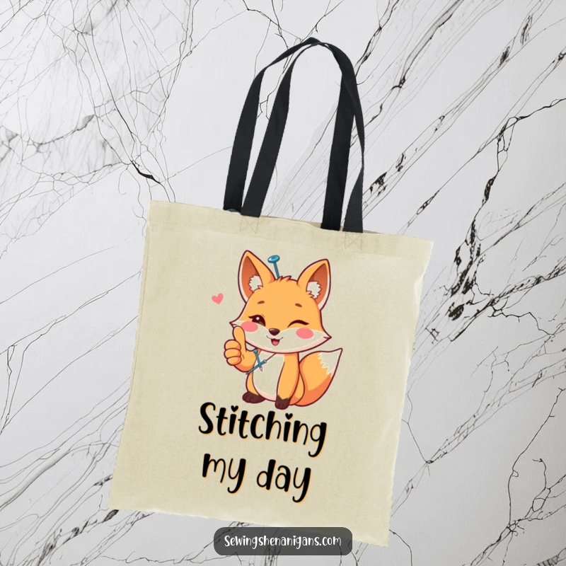 Funny happy fox wearing a sewing pin, giving a thumbs up, depicted on a tote bag, a practical funny gift.