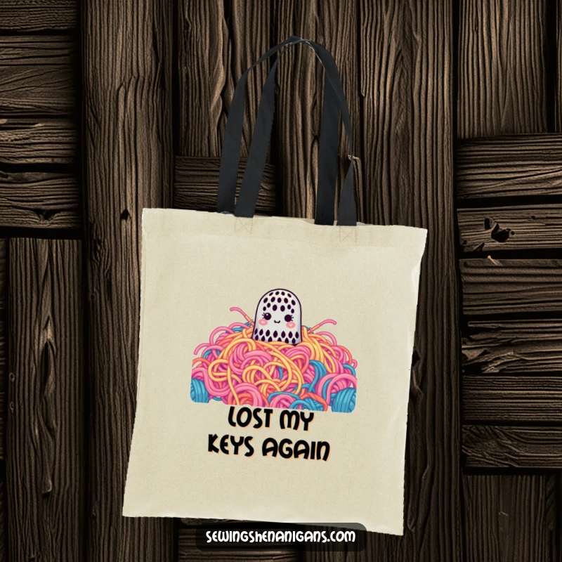 Funny Tote Bag: A cute thimble is lost in a gigantic pile of colorful yarn, a humorous yarn bag.